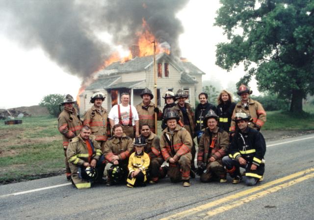 Riverhead firefighters pause for a 'Motley Crew' photo during a 'controlled burn' training drill on Sound Avenue.  Photo courtesy of 'Sonny Day Photo'